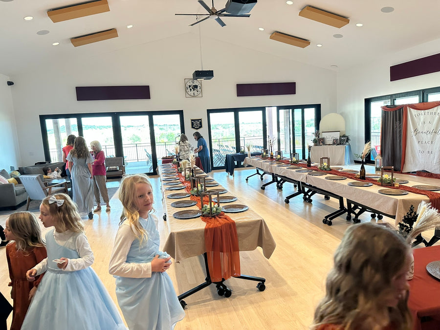 Clubhouse reception hall set with long banquet tables at Observer Ranch, Penrose Colorado