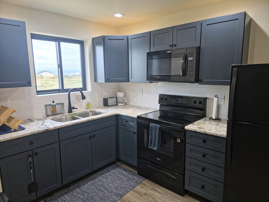 Kitchen, wide view, in Sirius A-frame cabin at Observer Ranch
