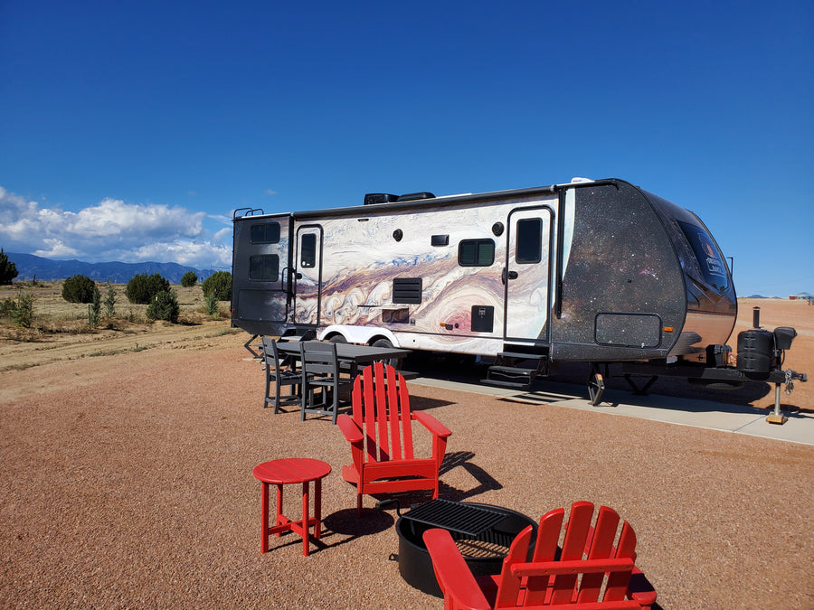 Jupiter planet camper with Great Red Spot vinyl wrap exterior at Observer Ranch