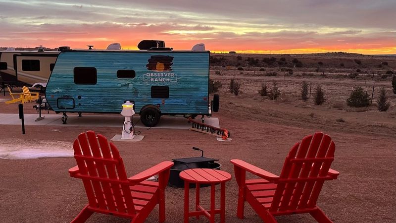RV site at sunset with chairs, Observer Ranch